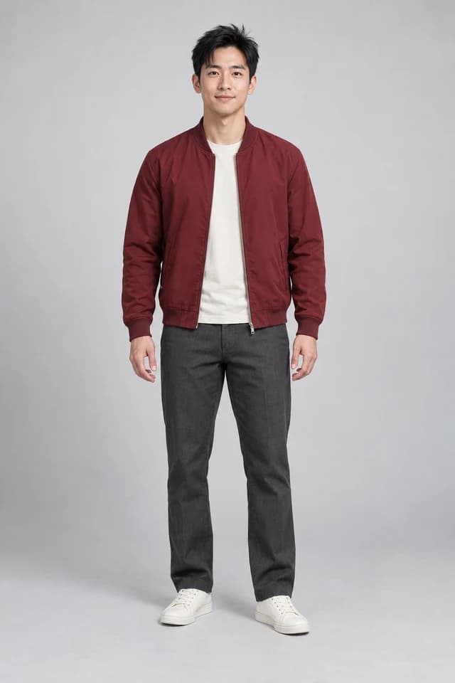 AI-generated fictional adult in a burgundy jacket, cream shirt and charcoal trousers, shown from head to shoes